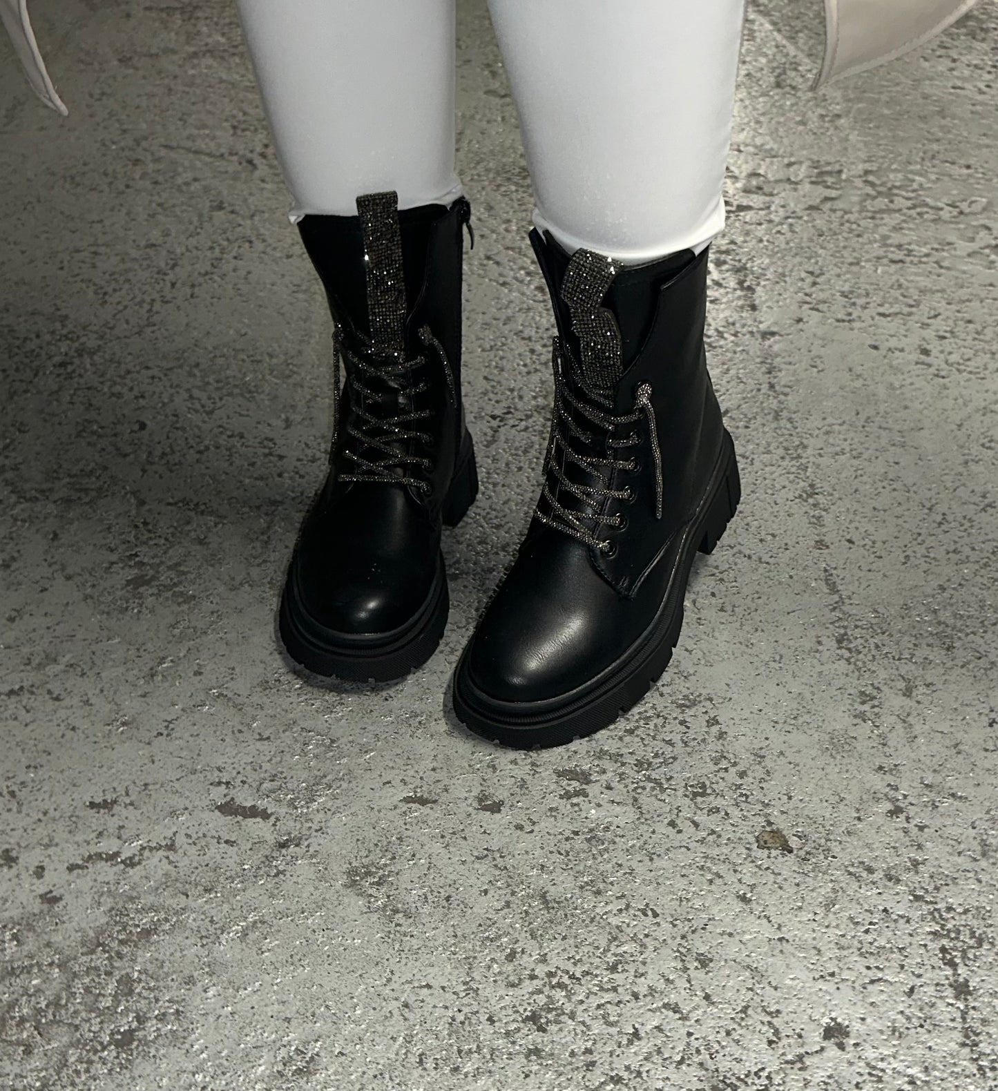 Boots with shiny details